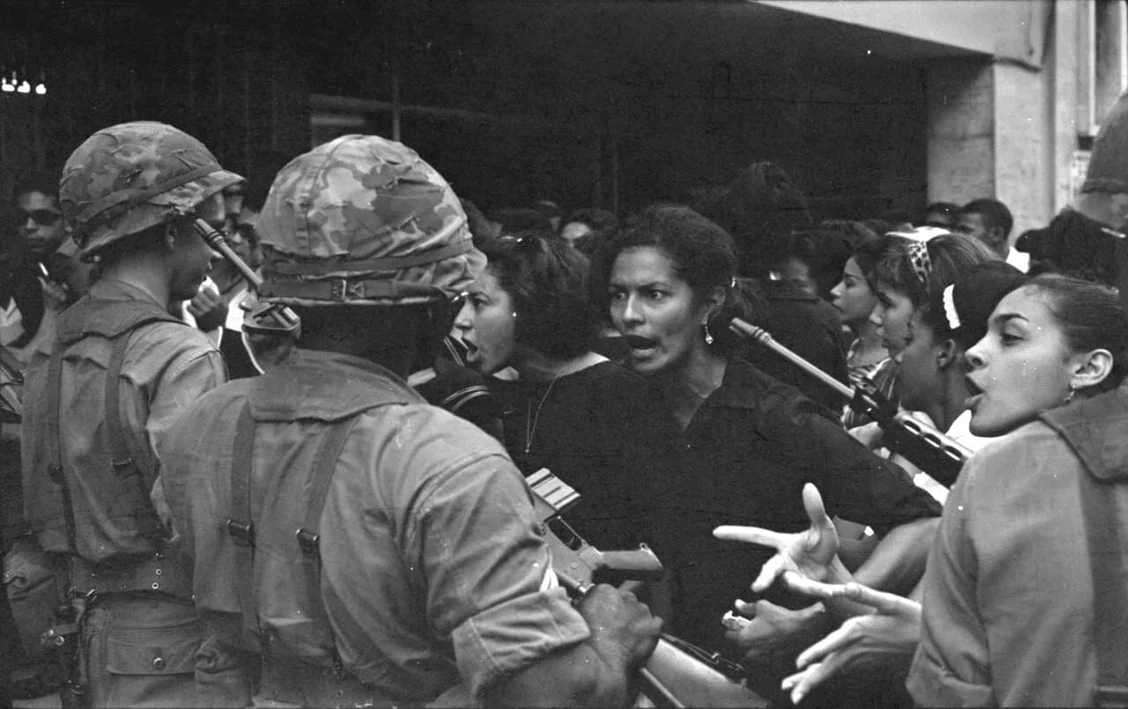 Dominican women confront US troops